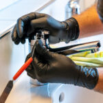 HYGOSTAR Nitril handschoen 'POWER GRIP', L, oranje, poedervrij