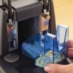 RAPESCO viergats perforator 4400, registratieponser, zwart