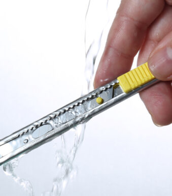 NT Cutter STL-ONE, aluminium-behuizing, 9 mm, zilver/geel