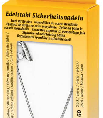 Veiligheidsspelden in metalen blik, zilverkleurig.